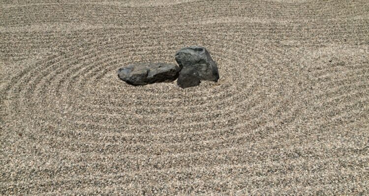 zen garden refelction to demonstrate the power of ease